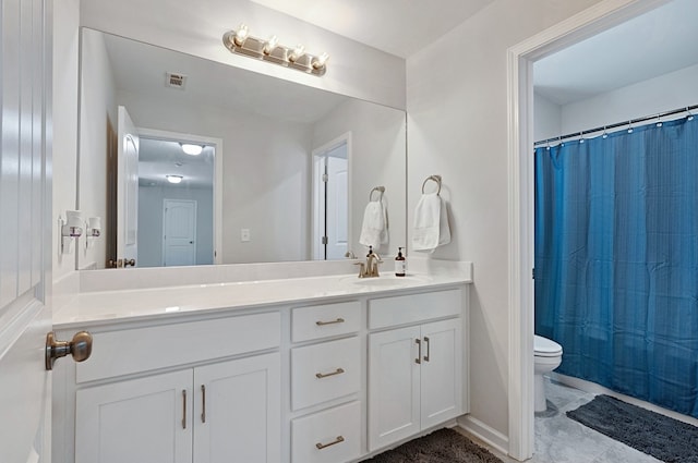 bathroom featuring vanity, a shower with curtain, and toilet