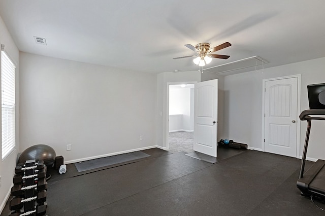 workout area featuring ceiling fan