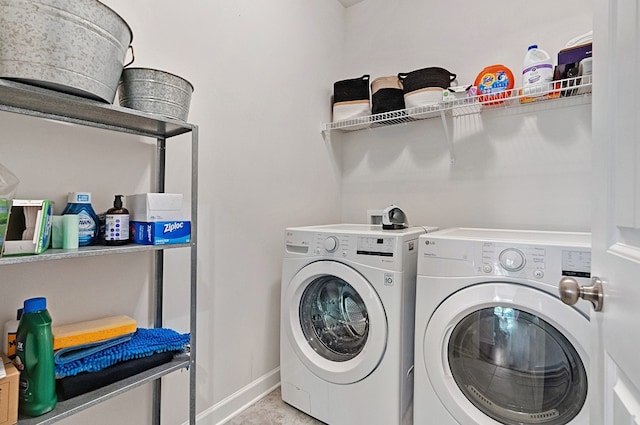 laundry room featuring washing machine and dryer