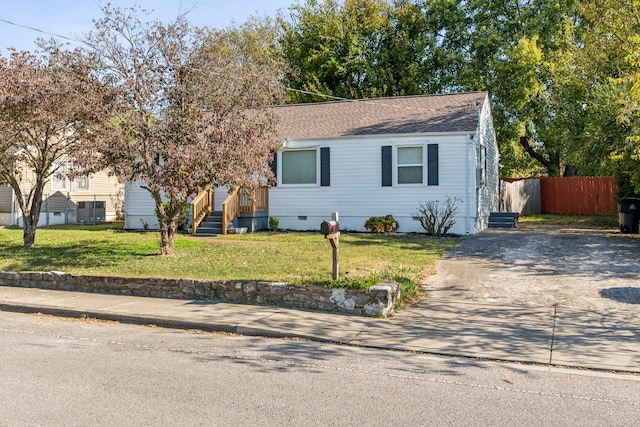 view of front of property with a front lawn