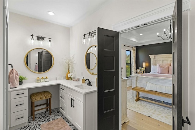 1878 Ferry Hill Rd, Dandridge, TN 37725 - bathroom featuring vanity, recessed lighting, a chandelier, connected bathroom, and wood finished floors
