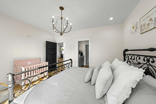 1878 Ferry Hill Rd, Dandridge, TN 37725 - bedroom featuring a chandelier, wood finished floors, and recessed lighting