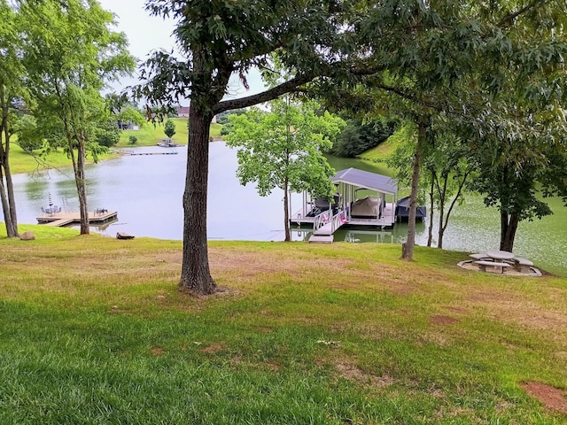 view of water feature with a dock