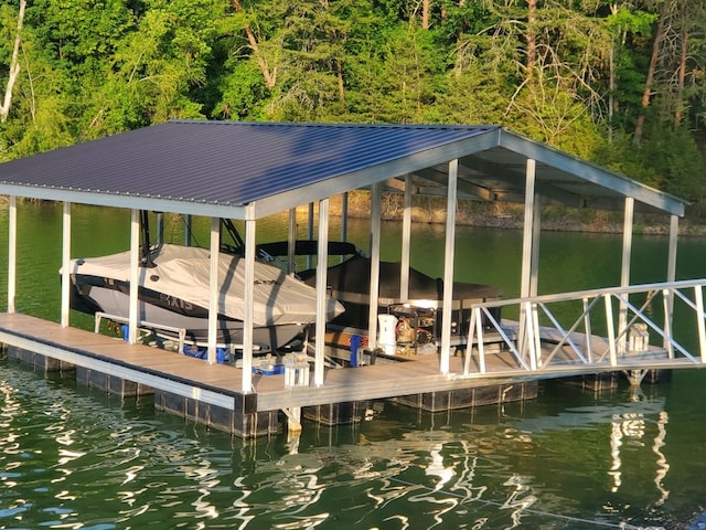 dock area featuring a water view