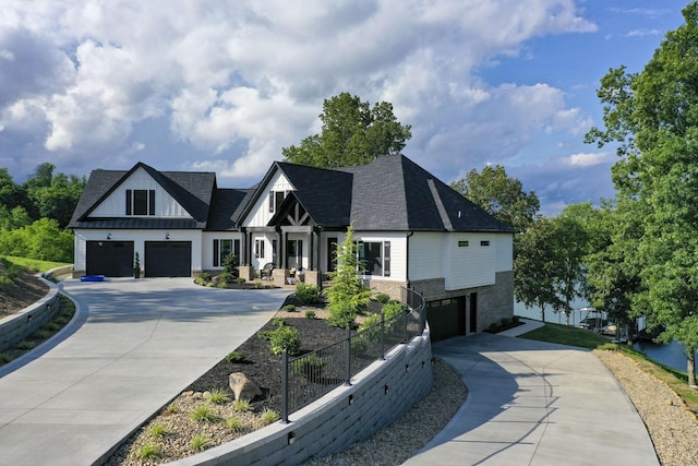 1878 Ferry Hill Rd, Dandridge, TN 37725 - view of front of property featuring driveway, an attached garage, and board and batten siding