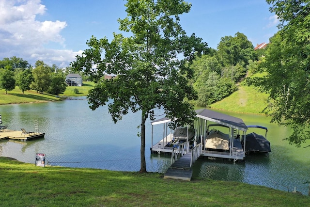 1878 Ferry Hill Rd, Dandridge, TN 37725 - dock with a water view, a yard, boat lift, and view of scattered trees