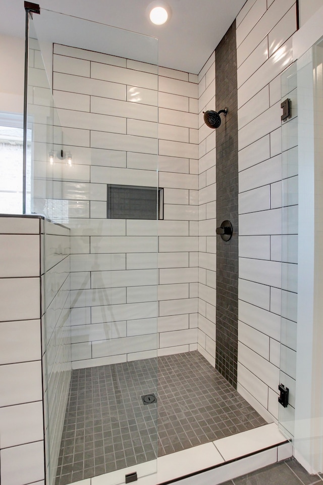 bathroom featuring an enclosed shower