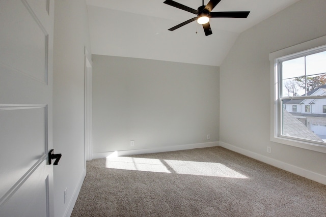 additional living space featuring vaulted ceiling, ceiling fan, and carpet floors