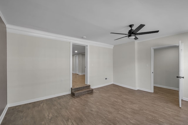 interior space with ornamental molding, hardwood / wood-style flooring, and ceiling fan