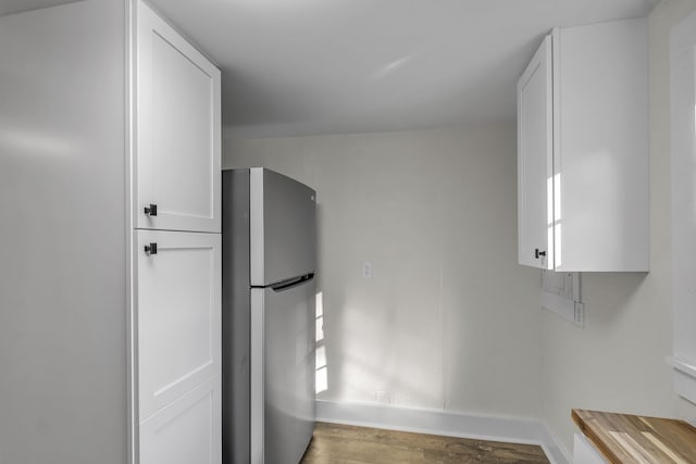 washroom with hardwood / wood-style flooring