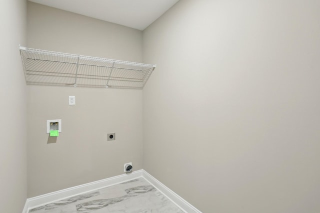 laundry room featuring washer hookup, marble finish floor, electric dryer hookup, laundry area, and baseboards