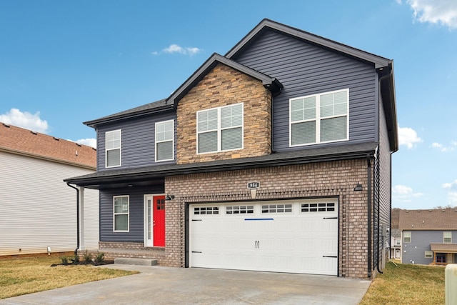 traditional home featuring driveway, brick siding, an attached garage, and stone siding