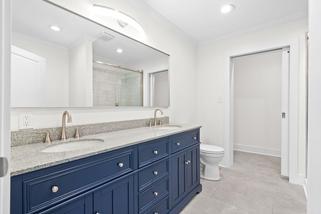 bathroom with toilet, ornamental molding, vanity, an enclosed shower, and tile patterned flooring