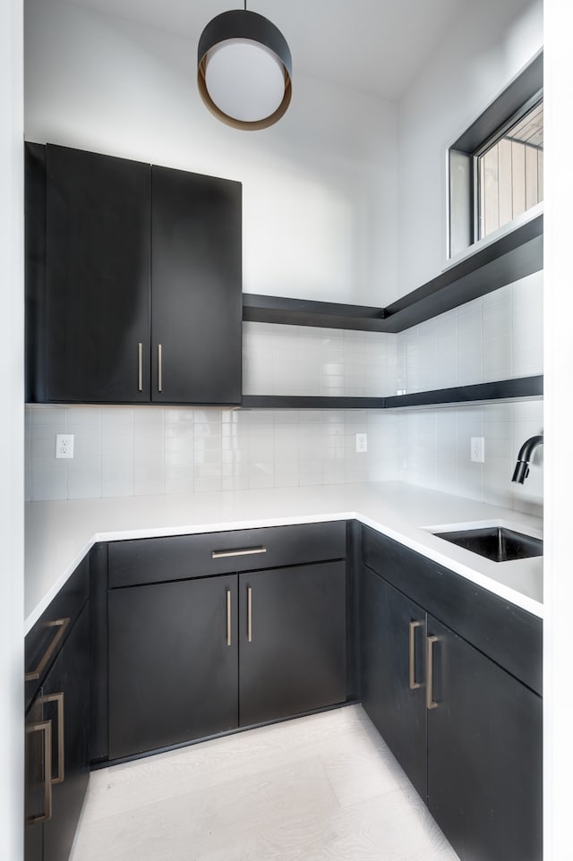 kitchen with sink and backsplash