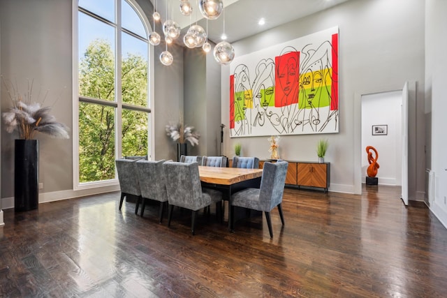 31 Annandale, Nashville, TN 37215 - dining room with wood finished floors, baseboards, and a chandelier