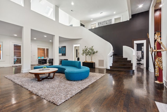 31 Annandale, Nashville, TN 37215 - living area featuring a towering ceiling, stairs, wood finished floors, baseboards, and recessed lighting