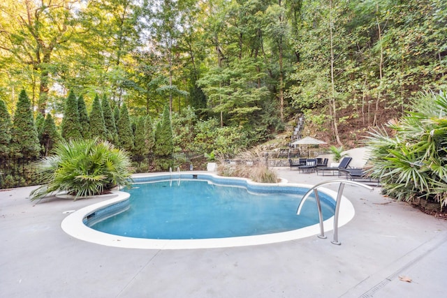 31 Annandale, Nashville, TN 37215 - outdoor pool featuring a patio and a view of trees