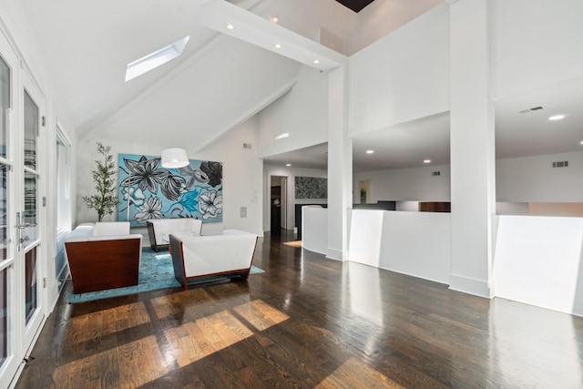 31 Annandale, Nashville, TN 37215 - unfurnished living room featuring high vaulted ceiling, wood finished floors, recessed lighting, and a skylight