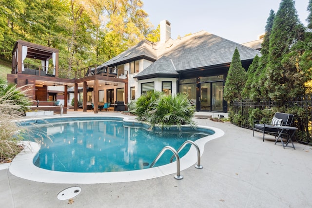 view of pool featuring a patio area