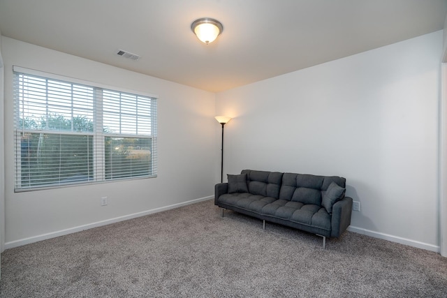 living area with carpet floors