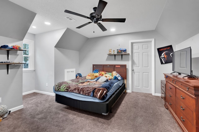 carpeted bedroom featuring lofted ceiling and ceiling fan