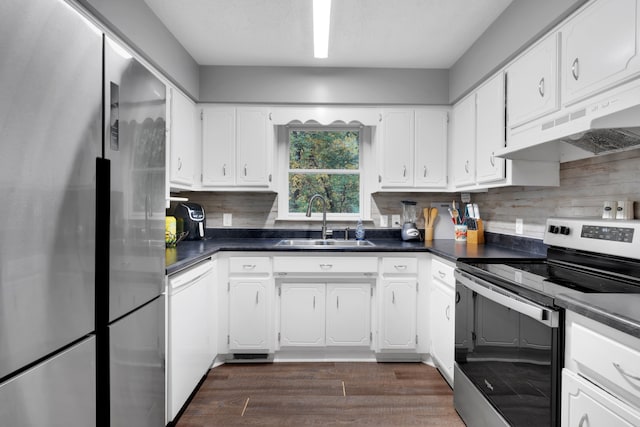 kitchen with appliances with stainless steel finishes, sink, dark hardwood / wood-style floors, and white cabinets