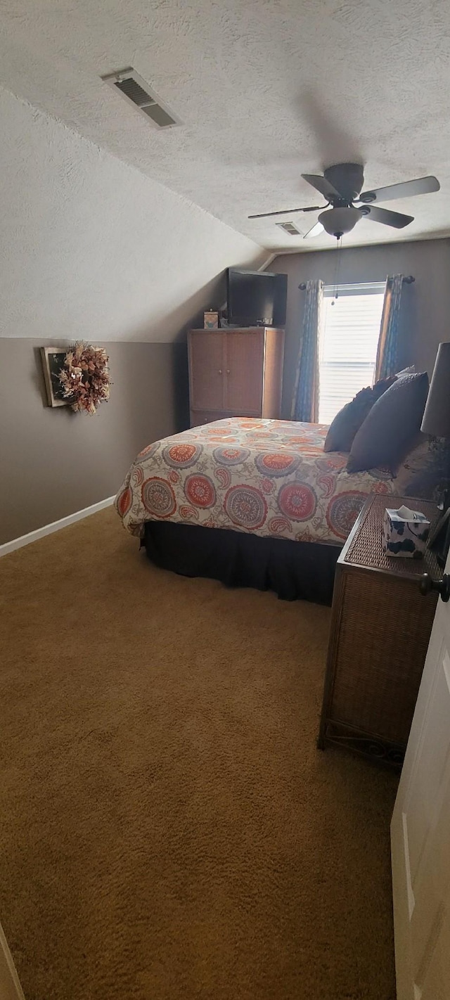 47 Hickory Ln, Sugar Tree, TN 38380 - carpeted bedroom featuring a textured ceiling, vaulted ceiling, ceiling fan, and baseboards