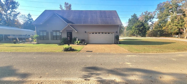 47 Hickory Ln, Sugar Tree, TN 38380 - view of front of property with a front lawn, concrete driveway, and roof with shingles