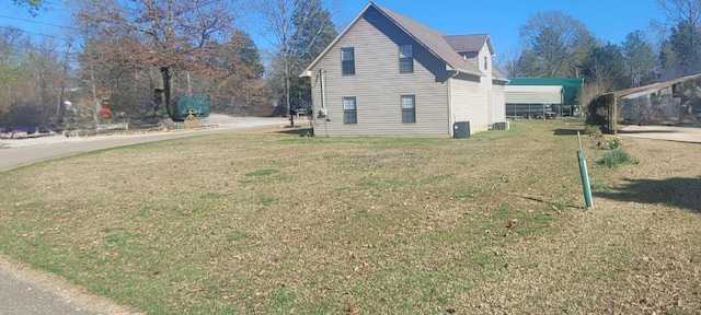 47 Hickory Ln, Sugar Tree, TN 38380 - view of property exterior with a yard and cooling unit