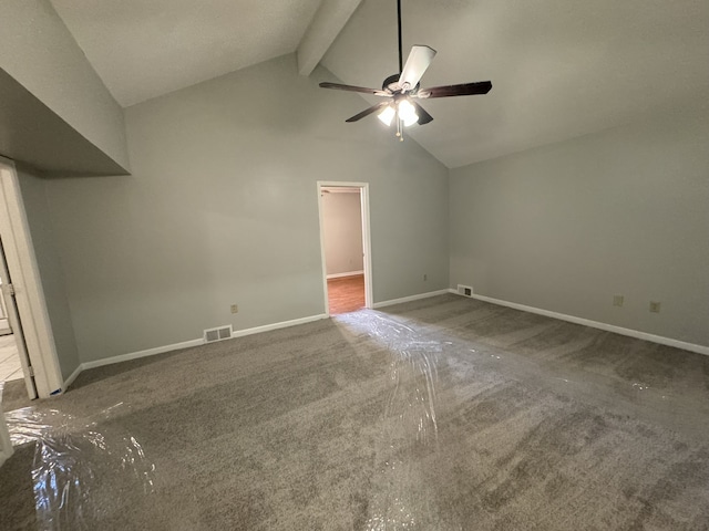 interior space featuring ceiling fan and vaulted ceiling with beams