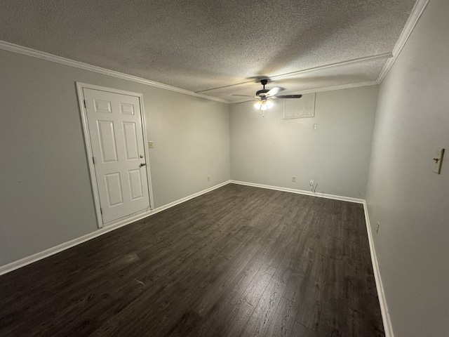 unfurnished room featuring dark hardwood / wood-style flooring, a textured ceiling, and crown molding