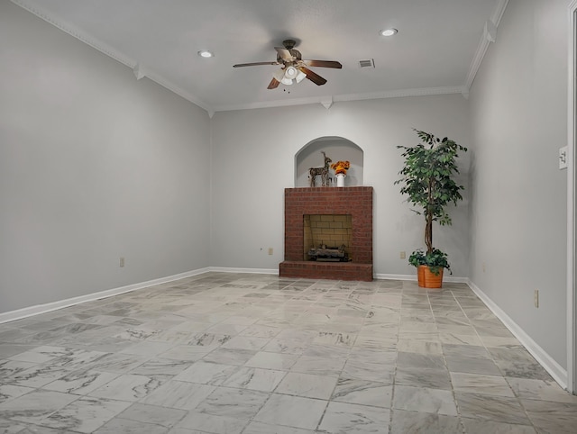 unfurnished living room with a brick fireplace, ceiling fan, and crown molding