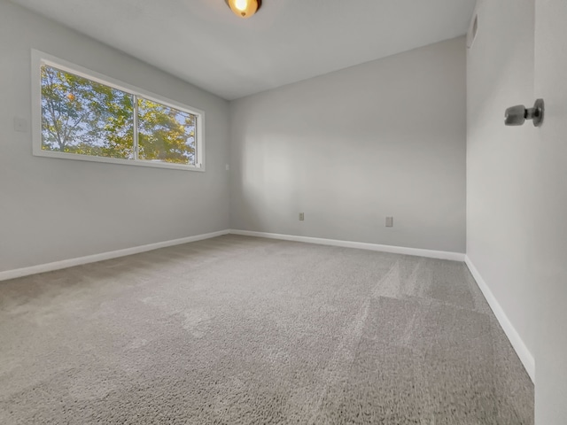 view of carpeted spare room