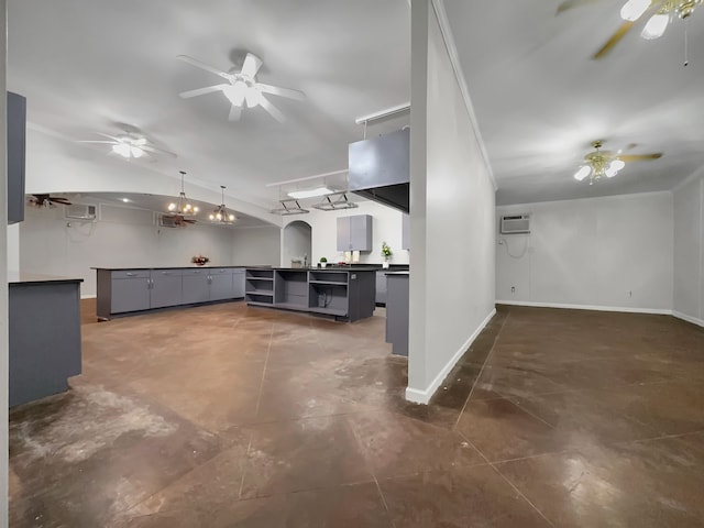 unfurnished living room with a wall unit AC and lofted ceiling