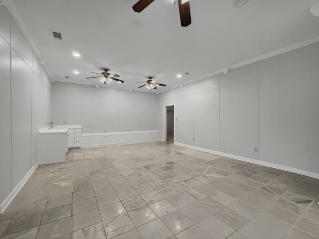 unfurnished room with ornamental molding and ceiling fan