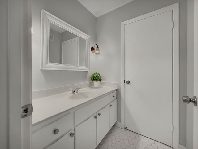 bathroom featuring vanity and tile patterned flooring