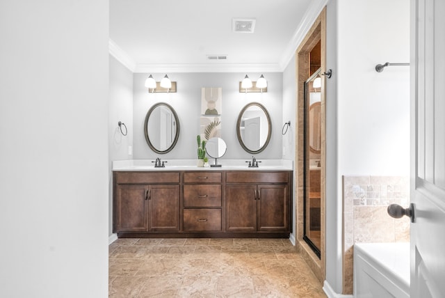 bathroom featuring vanity, ornamental molding, and a shower with shower door