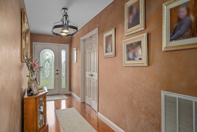 foyer featuring light hardwood / wood-style flooring