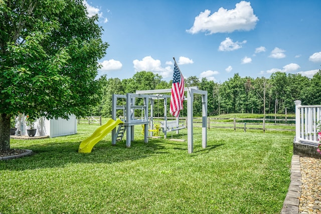 view of play area featuring a yard