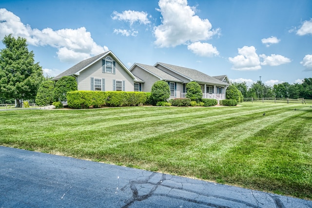 view of front of home featuring a front lawn