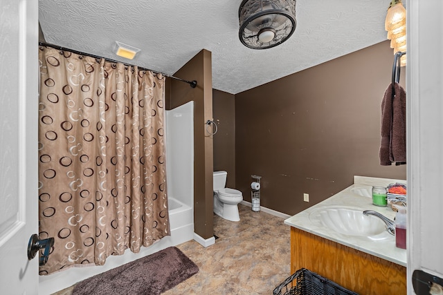 full bathroom featuring vanity, shower / bath combination with curtain, a textured ceiling, and toilet