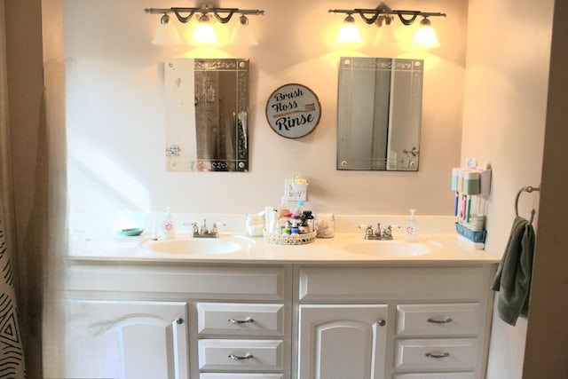 bathroom with double vanity and a sink
