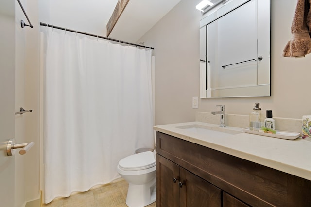 bathroom with a shower with shower curtain, vanity, and toilet