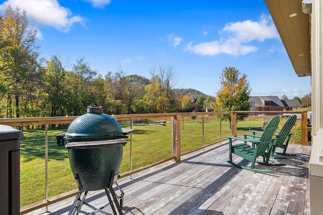 deck featuring a yard