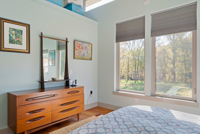 bedroom with light wood-type flooring