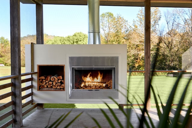 details featuring an outdoor fireplace