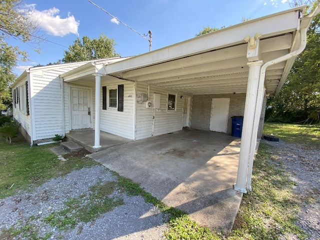 view of car parking featuring a carport