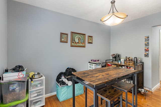 dining room featuring light hardwood / wood-style floors