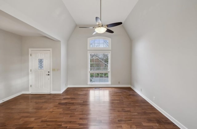 entrance foyer featuring ceiling fan, dark hardwood / wood-style flooring, and vaulted ceiling