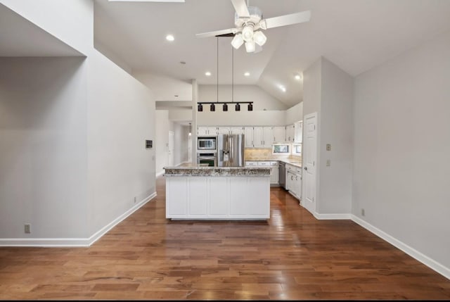 kitchen featuring stainless steel appliances, ceiling fan, dark wood-type flooring, high vaulted ceiling, and white cabinets